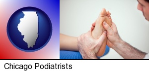 Chicago, Illinois - a podiatrist practicing reflexology on a human foot