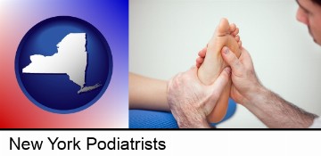 a podiatrist practicing reflexology on a human foot in New York, NY